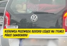 Samochód z dzieckiem na tylniej szybie