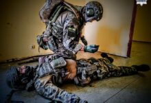 zajęcia Strzelców w Międzyrzeczu Górnym dwóch mężczyzn w mundurach wojskowych